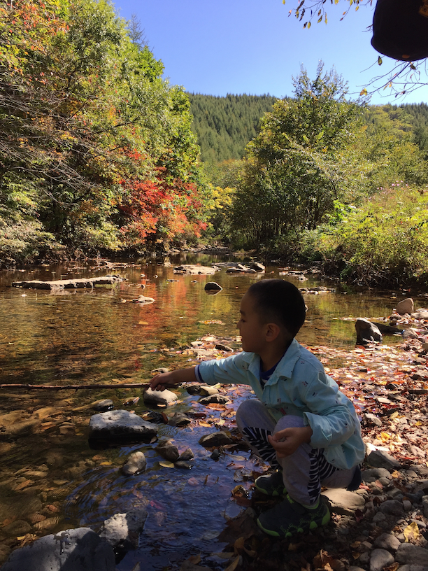 My little handsome beside the stream.